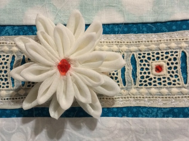 Embeliished with a bead!